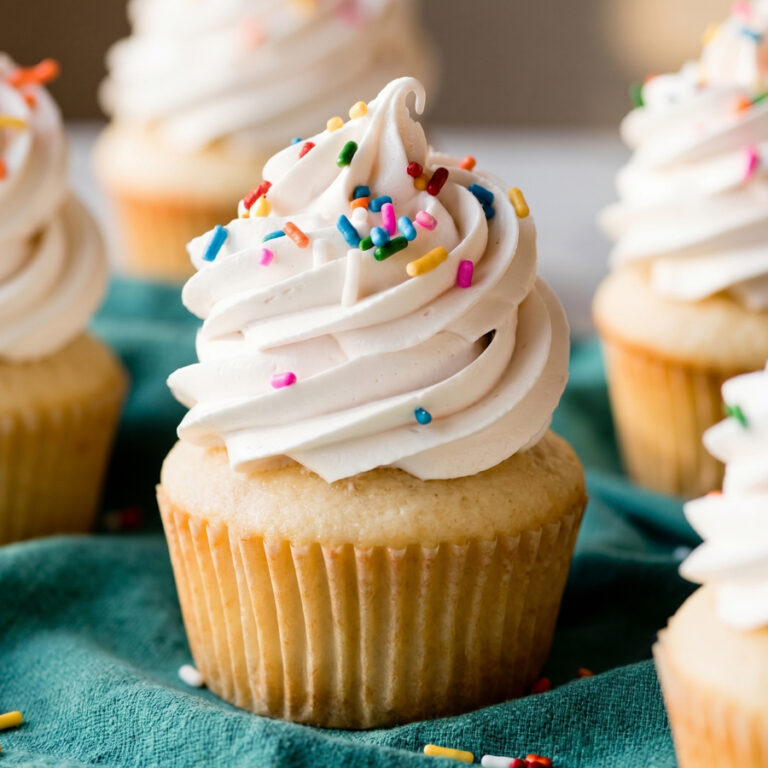 Perfect Swiss Meringue Frosting (Silky & Not Too Sweet!) cupcake decorated with swiss meringue frosting